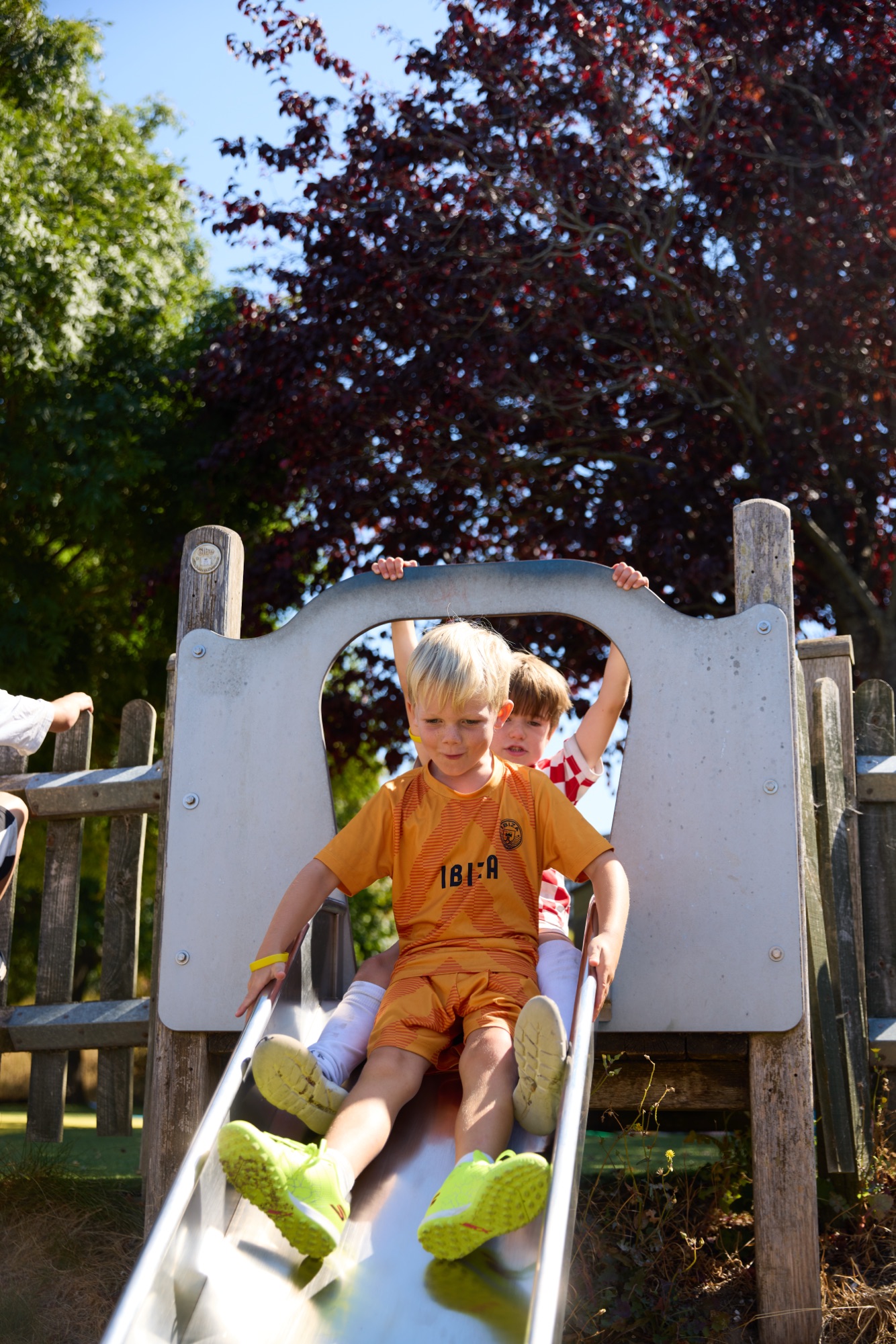 Child on a playground slide