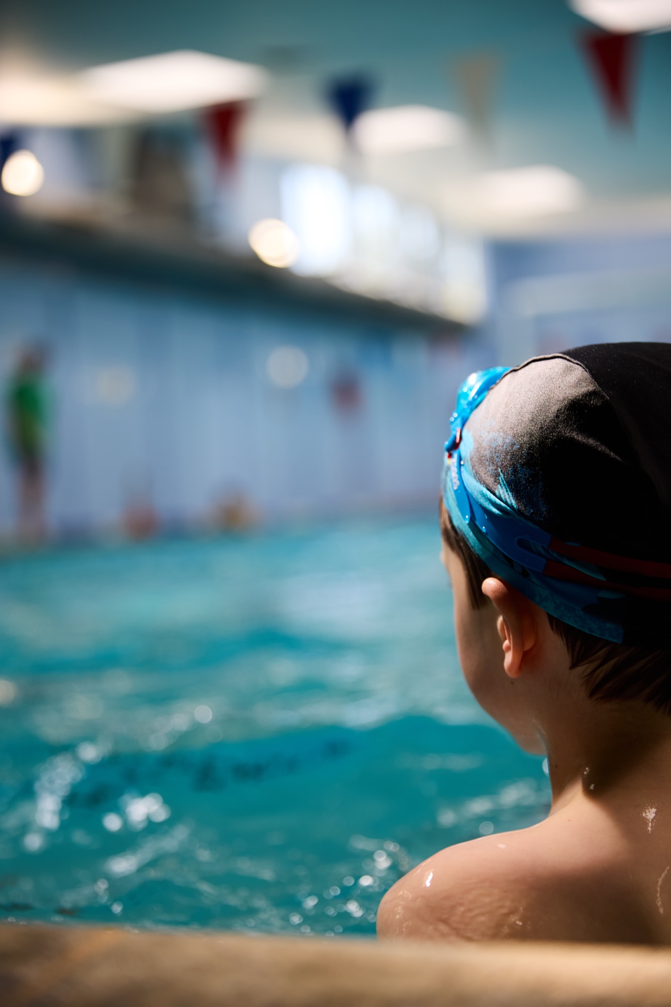 Boy looking out over the pool